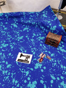 Blue Paint Splatters - cotton lycra - 150cm wide - clearance