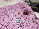 Black Polka Dots on Pink - cotton lycra - 150cm wide - clearance