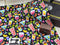 Stretch knit fabric digitally printed with bright images of cocktail drinks