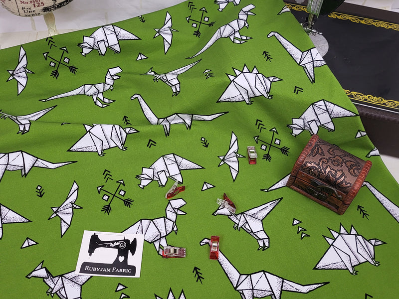 Green Origami Dinosaurs - cotton lycra - 150cm wide