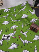 Green Origami Dinosaurs - cotton lycra - 150cm wide