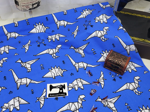 Blue Origami Dinosaurs - cotton lycra - 150cm wide