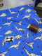 Blue Origami Dinosaurs - cotton lycra - 150cm wide