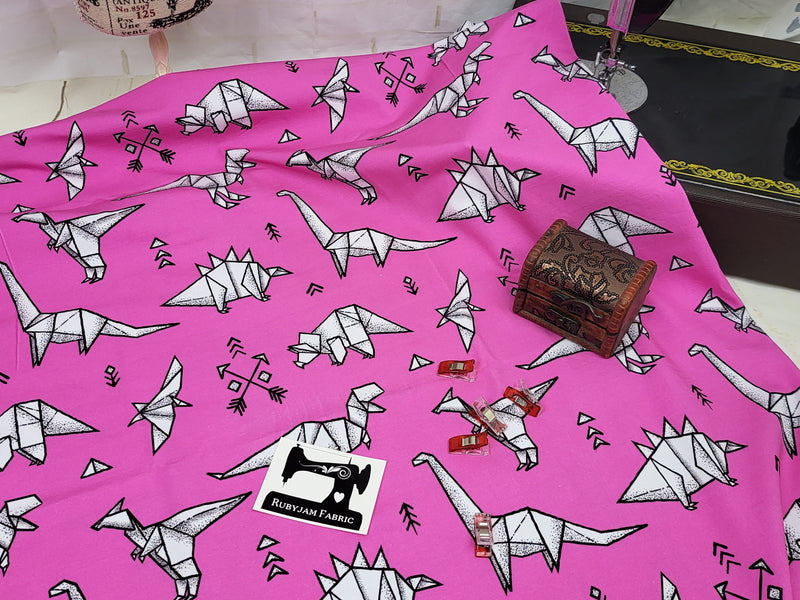 Pink Origami Dinosaurs - cotton lycra - 150cm wide