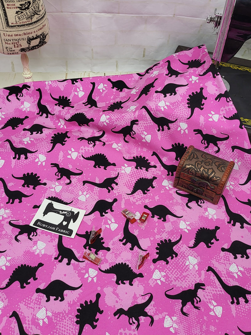 Dinosaurs - Pink - cotton lycra - 150cm wide