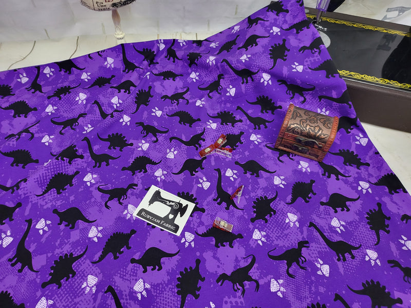 Dinosaurs - Purple - cotton lycra - 150cm wide