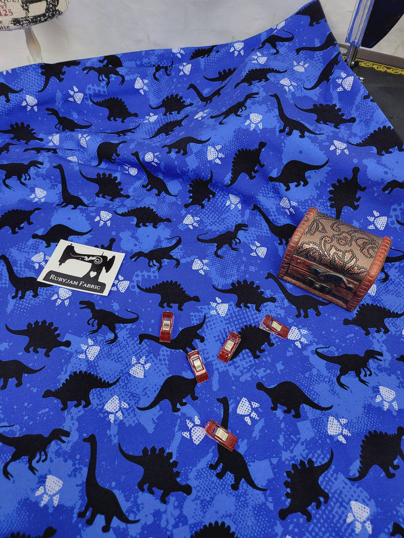 Dinosaurs - Blue - cotton lycra - 150cm wide