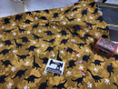 Dinosaurs - Brown - cotton lycra - 150cm wide