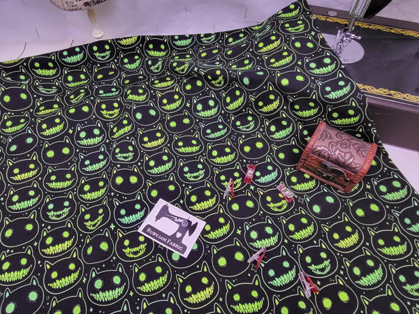 Neon Spooky Cat Heads - cotton lycra - 150cm wide