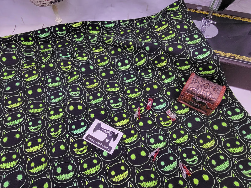 Neon Spooky Cat Heads - cotton lycra - 150cm wide