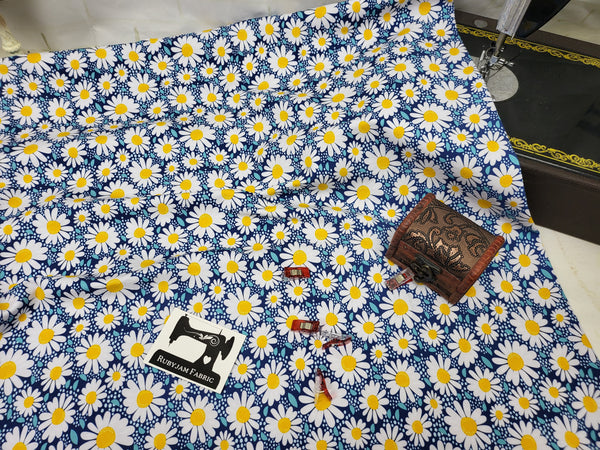 White Daisies on Blue - cotton lycra - 150cm wide