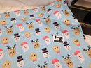 Christmas Faces Blue - cotton lycra - 150cm wide - clearance