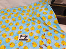 Yellow Rubber Ducks - cotton lycra - 150cm wide