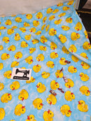 Yellow Rubber Ducks - cotton lycra - 150cm wide