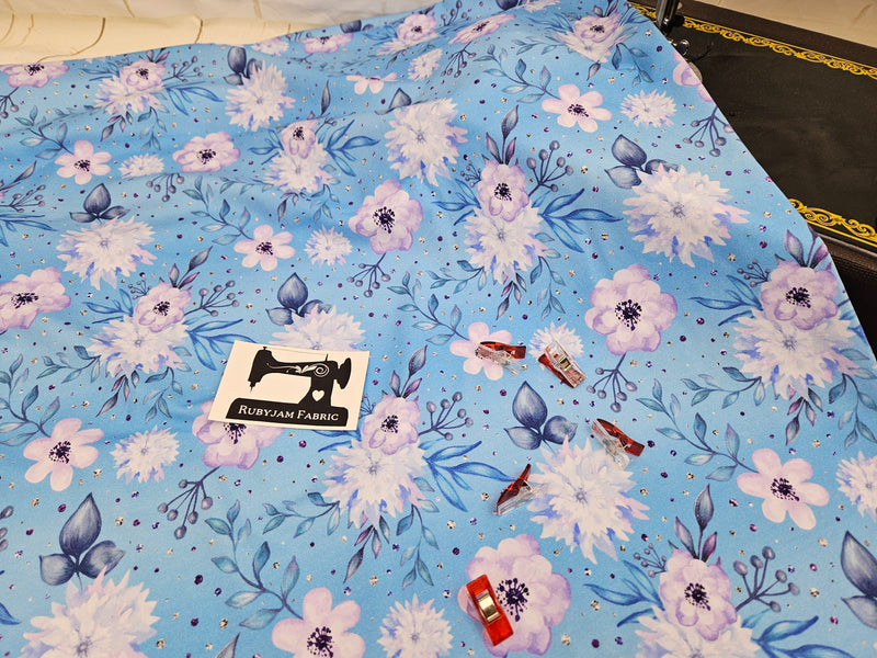 Purple Floral on Blue - cotton lycra - 150cm wide