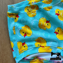 Yellow Rubber Ducks - cotton lycra - 150cm wide