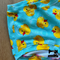 Yellow Rubber Ducks - cotton lycra - 150cm wide