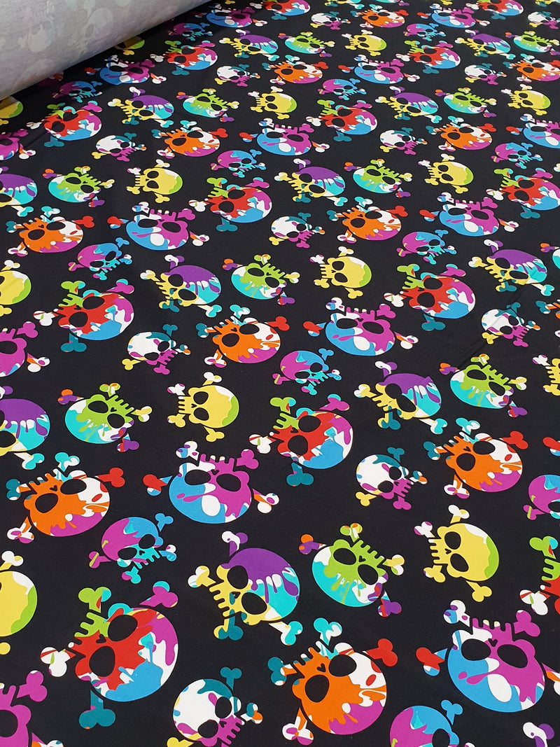 Brightly coloured skull printed cotton lycra jersey knit fabric. This stretch knit has a 4 way stretch.