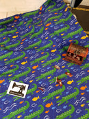 Crocodiles on Blue - cotton lycra - 150cm wide