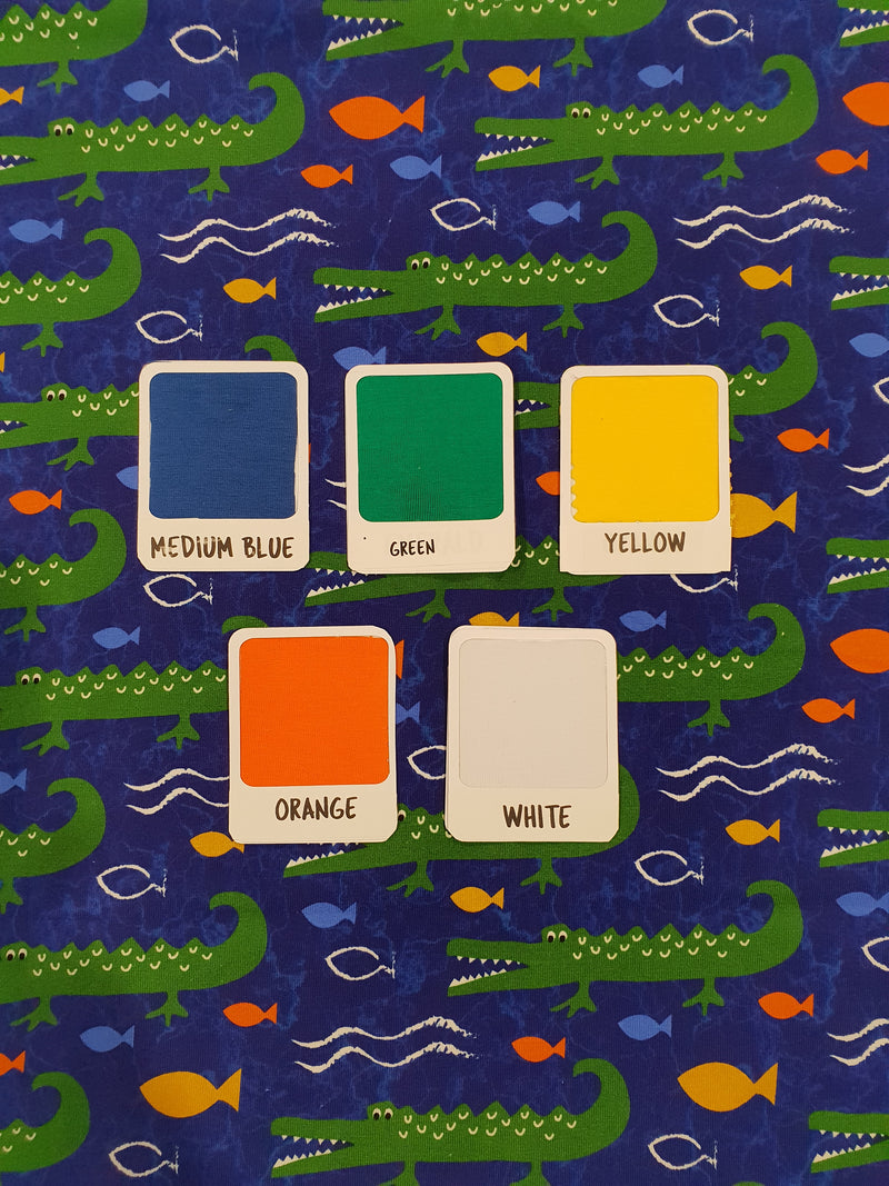 Crocodiles on Blue - cotton lycra - 150cm wide