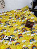 Rainbows on Yellow - cotton lycra - 150cm wide - clearance