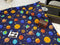 Happy Planets - cotton lycra - 150cm wide