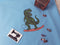 Surfing Dinosaur - LIGHT BLUE - Panels On Demand