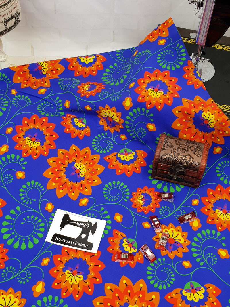 Sunset Bells Floral on Blue - cotton lycra - 150cm wide - clearance