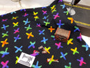 Rainbow Crosses on Black - cotton lycra - 150cm wide