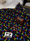 Rainbow Stars on Black - cotton lycra - 150cm wide - clearance