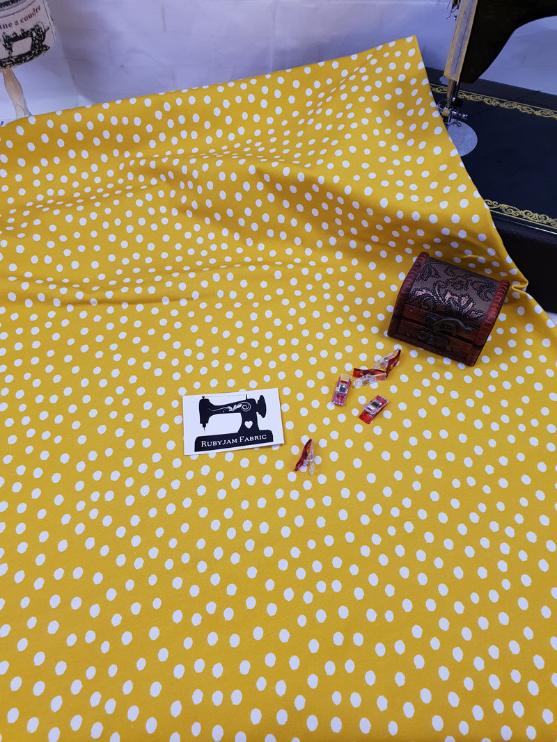 White Polka Dots on Yellow - cotton lycra - 150cm wide