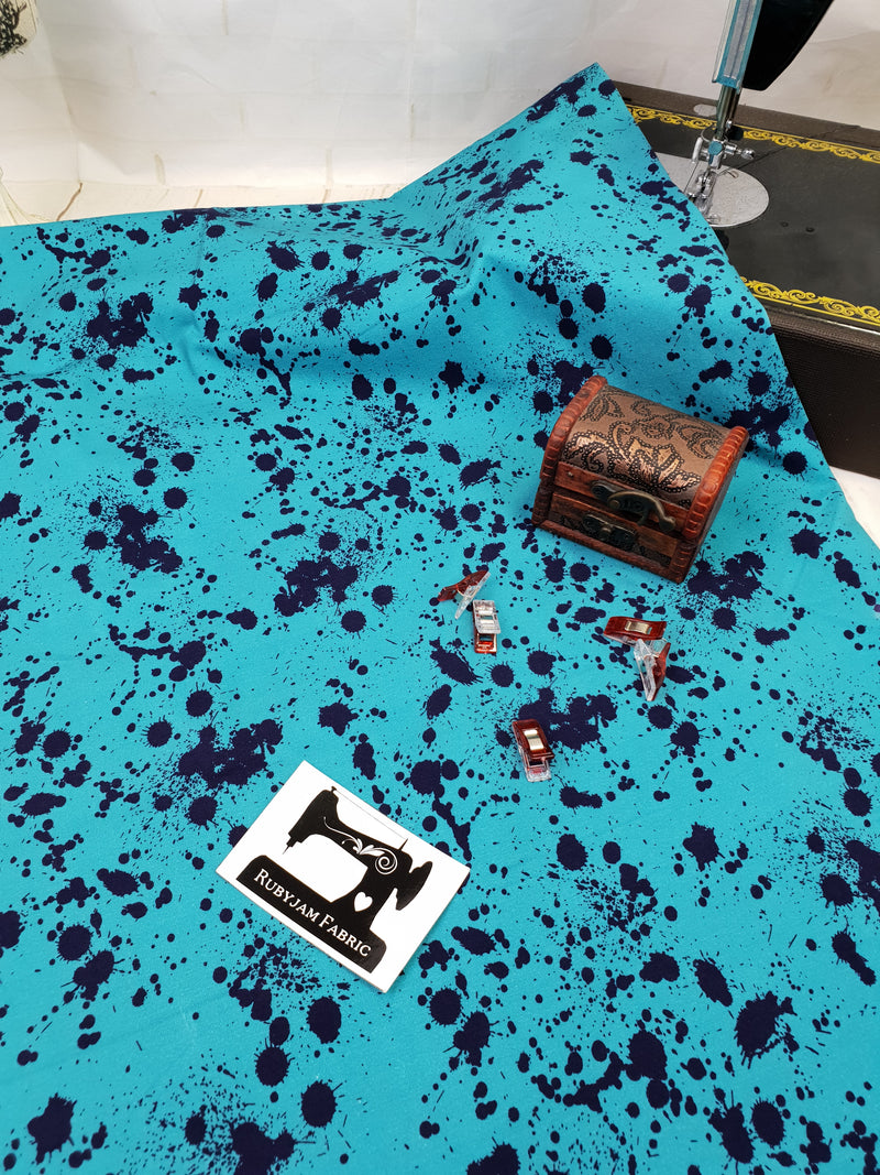 Aquamarine and Navy Paint Splatter - cotton lycra - 150cm wide