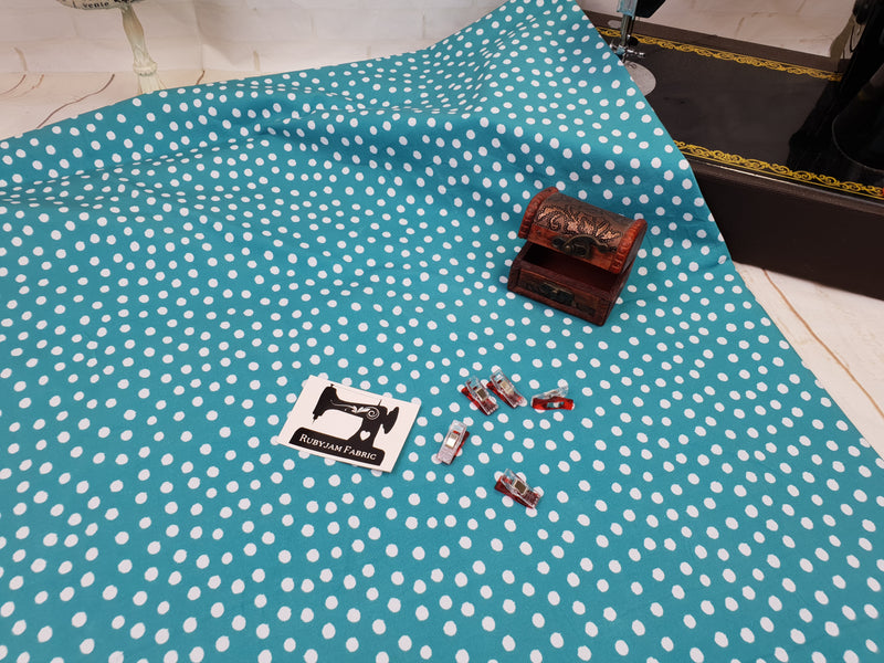 White Polka Dots on Sea Green - cotton lycra - 150cm wide