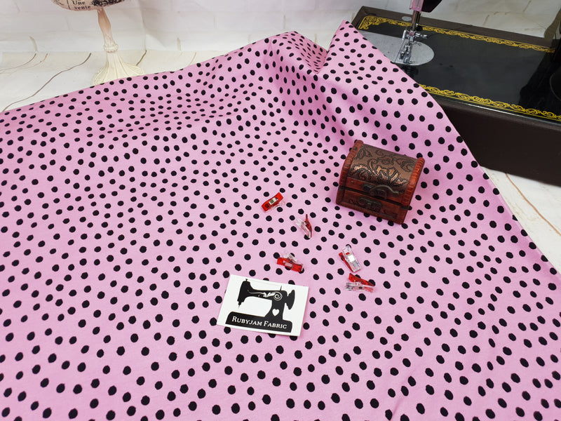 Black Polka Dots on Pink - cotton lycra - 150cm wide - clearance