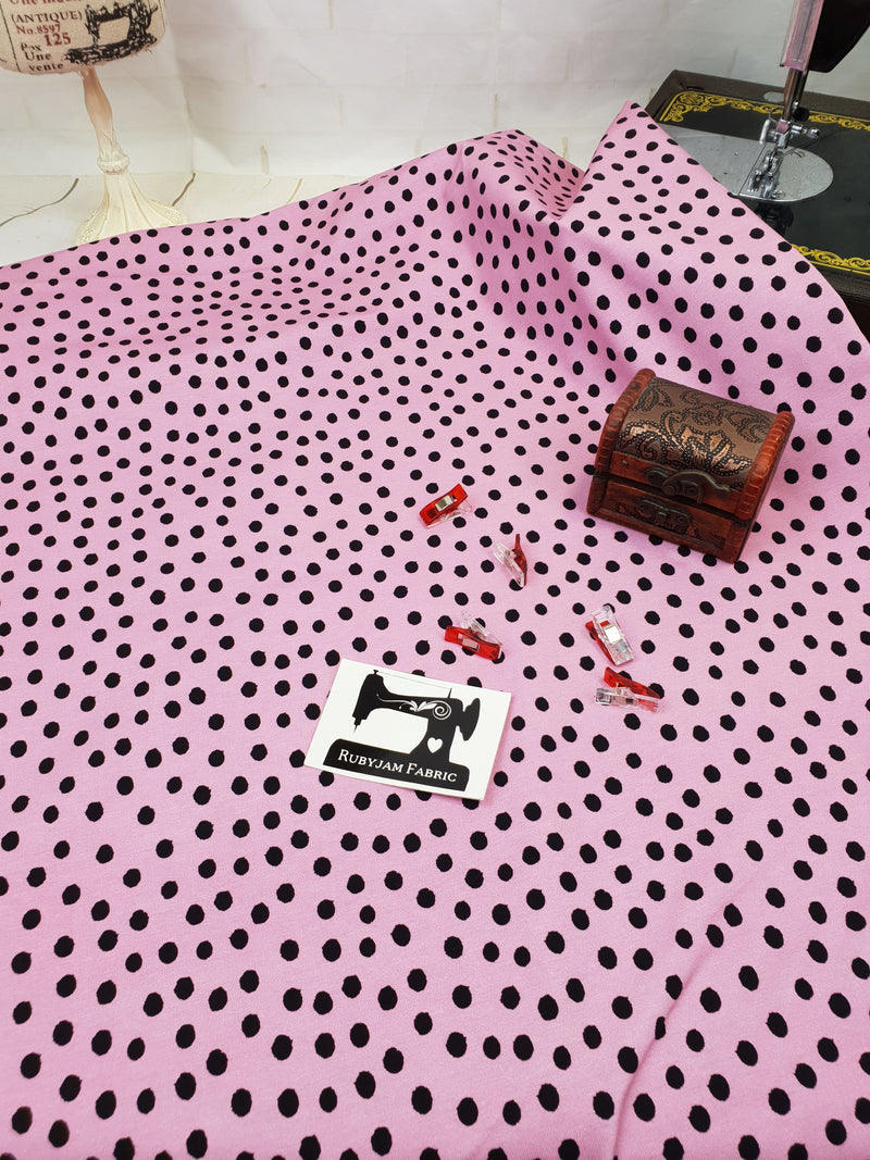 Black Polka Dots on Pink - cotton lycra - 150cm wide - clearance