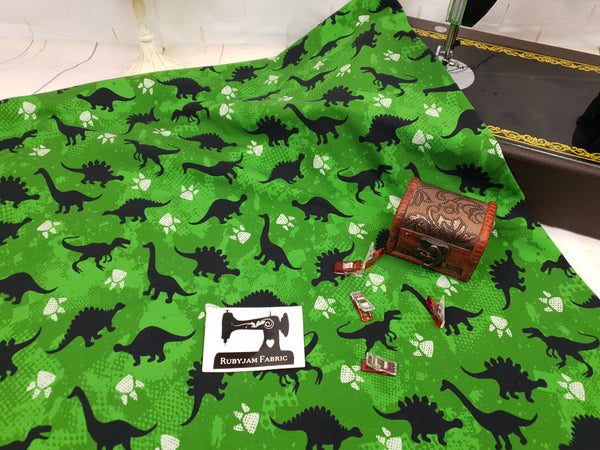 Dinosaurs - Green - cotton lycra - 150cm wide