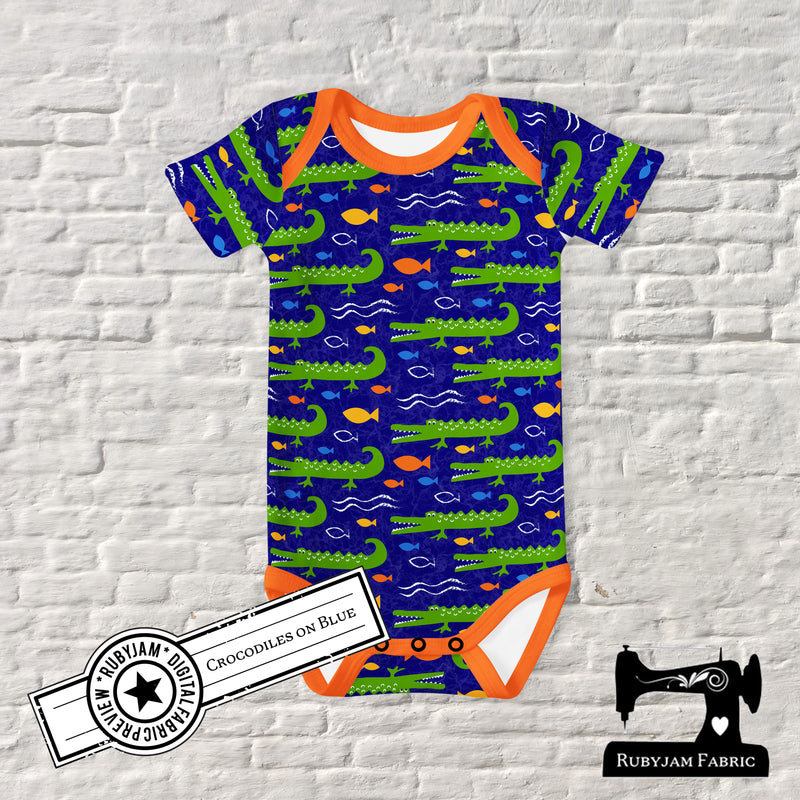 Crocodiles on Blue - cotton lycra - 150cm wide