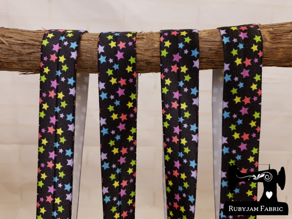 1M Coloured Stars on Black - Printed - 1" (25mm) - Fold Over Elastic (FOE)