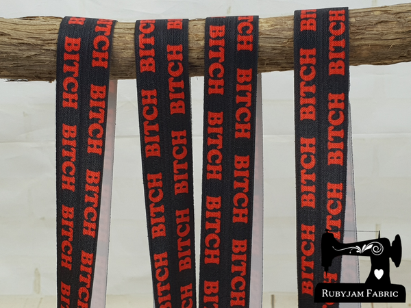 Red BITCH on Black - Printed - 1" (25mm) - Fold Over Elastic (FOE) - clearance